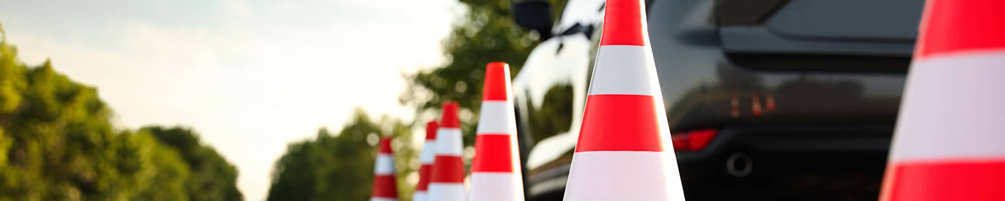 Learner driver navigating road cones in Wrexham
